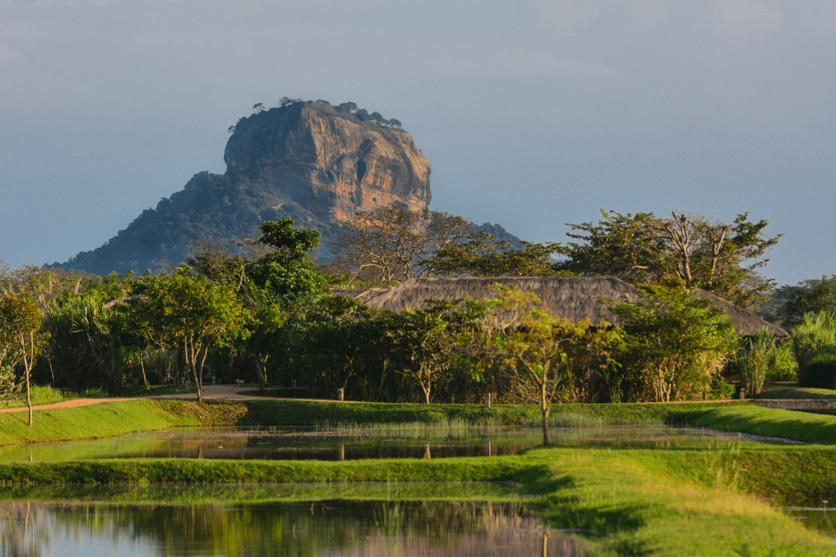 Sigiriya rock fortress rising over the plains on an active Xclusive Adventures Cultural Triangle day in Sri Lanka