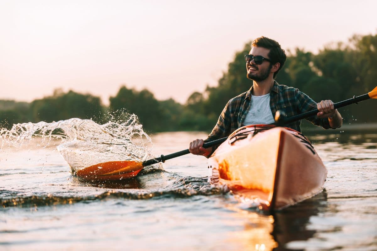 Paddler gliding through quiet mangrove waterways on an Xclusive Adventures Sri Lanka nature day