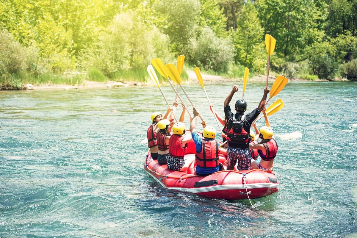 Raft crew on the Kelani River white-water rapids, Kitulgala, Sri Lanka